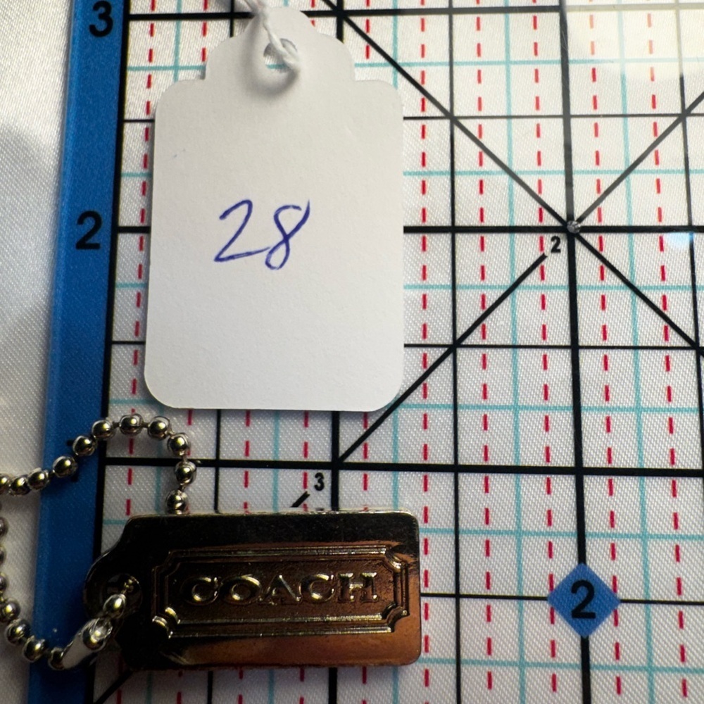 Coach Gold Hang tag